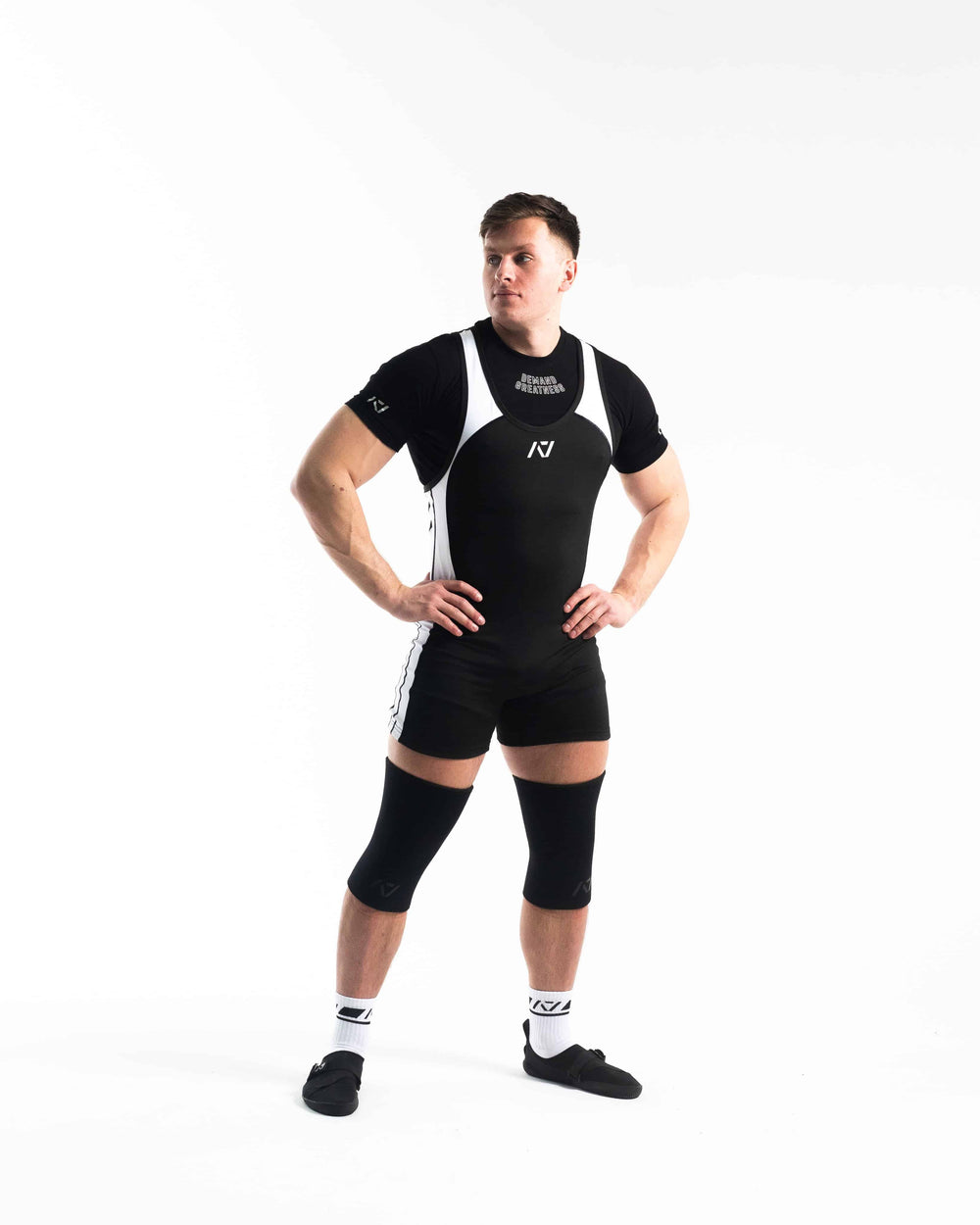 Singlet para sentadilla, banca y peso muerto color negro con blanco