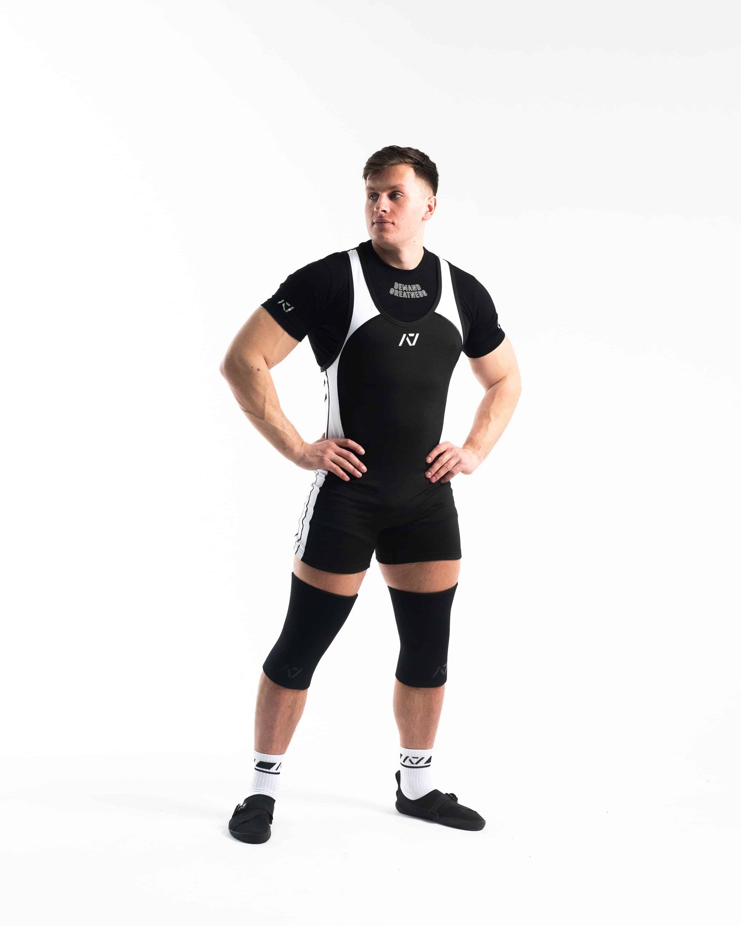 Singlet para sentadilla, banca y peso muerto color negro con blanco