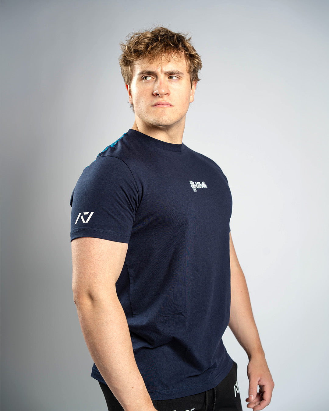 Camiseta técnica para powerlifting, con grip anti-deslizante en la espalda
