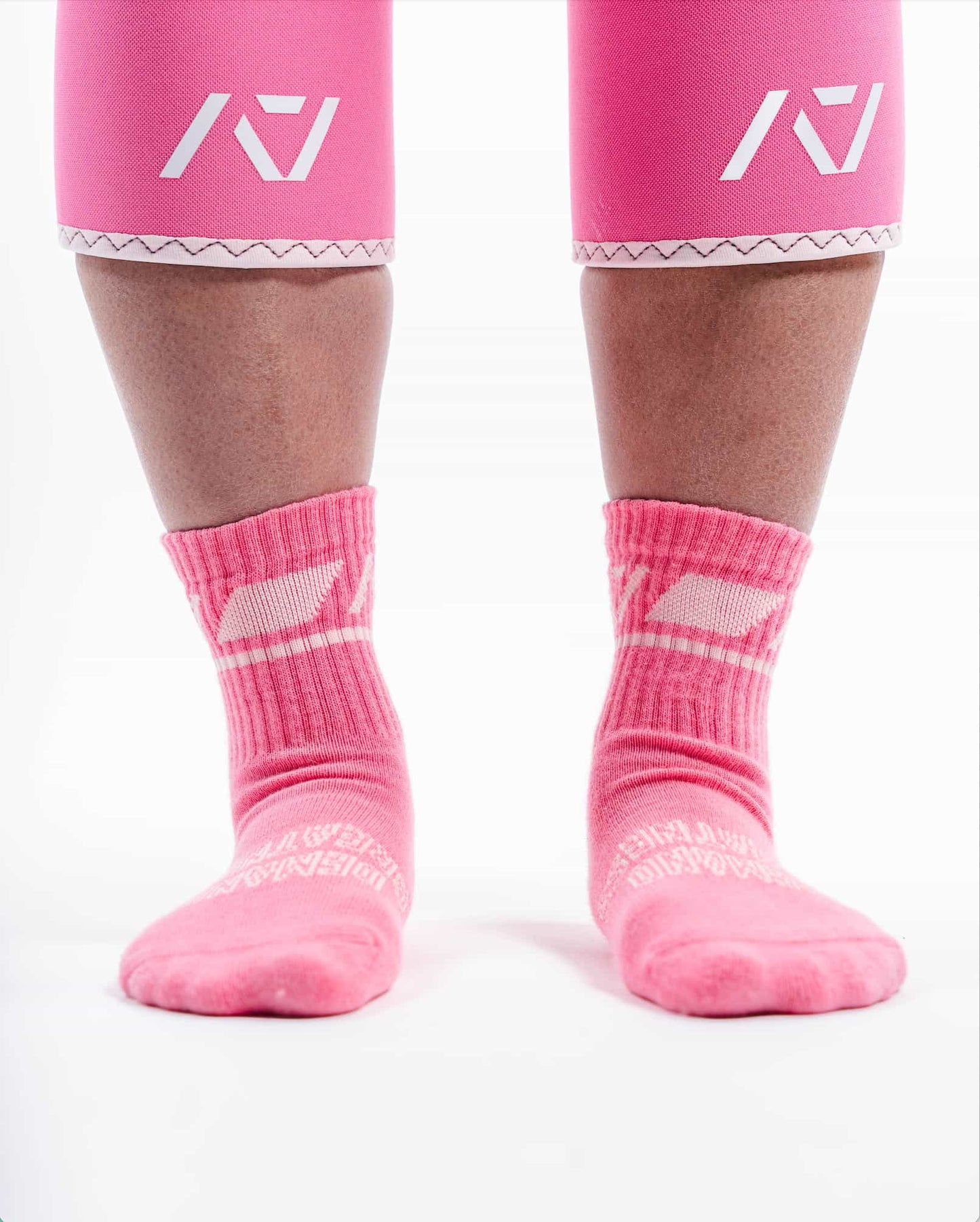 Calcetas rosas para entrenar con rodilleras A7