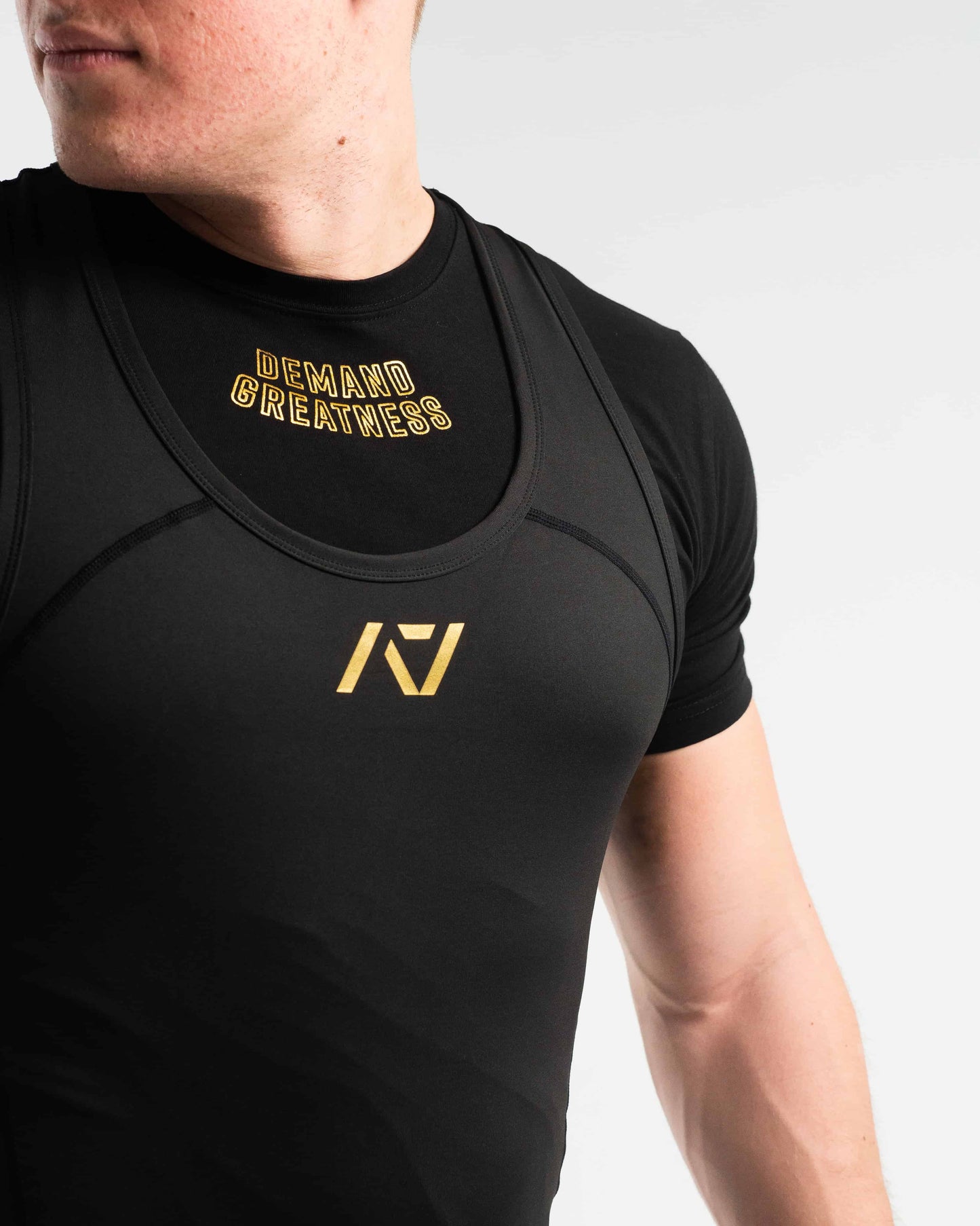 Singlet negro con dorado A7