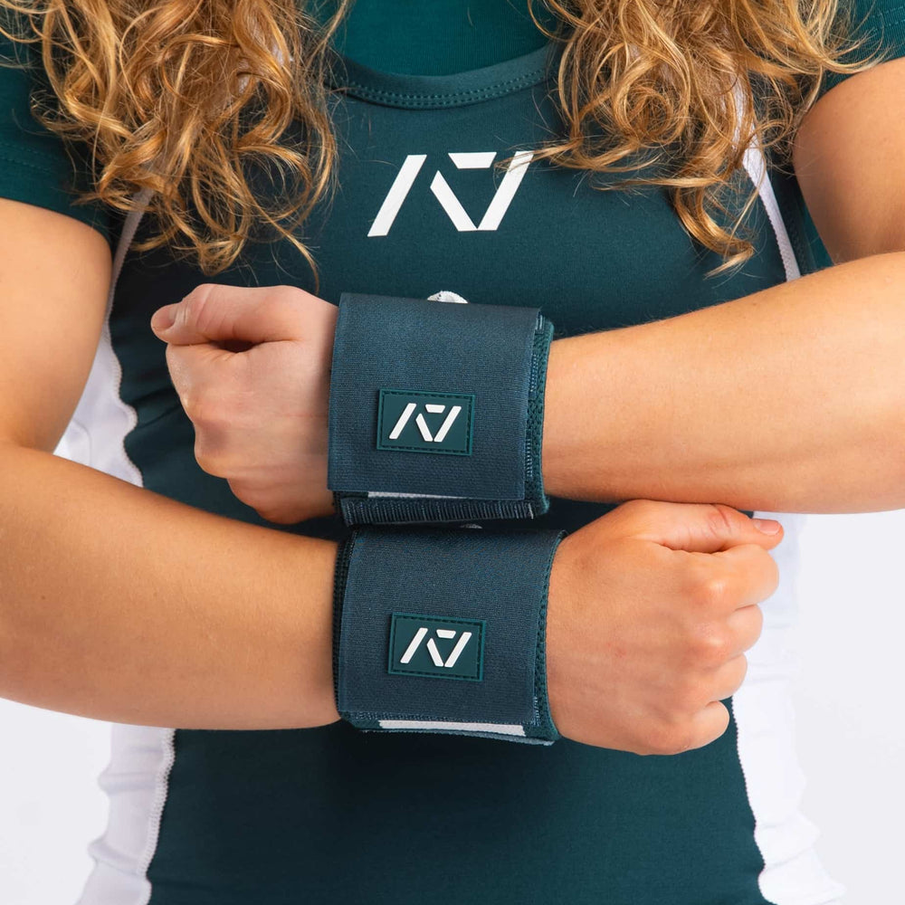 Wrist wraps ajustables color verde Emerald Forás con soporte técnico