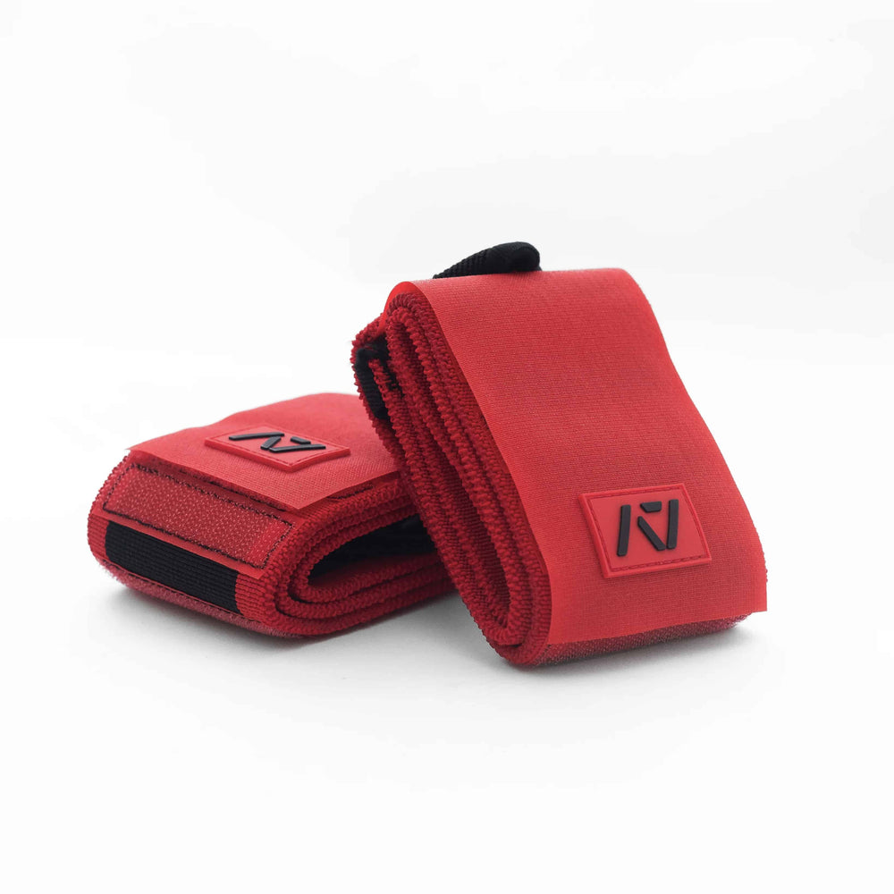 Wrist wraps ajustables en rojo con soporte para powerlifting 